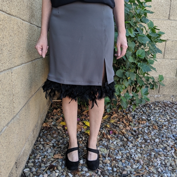 Dresses & Skirts - Women's feather trimmed skirt.